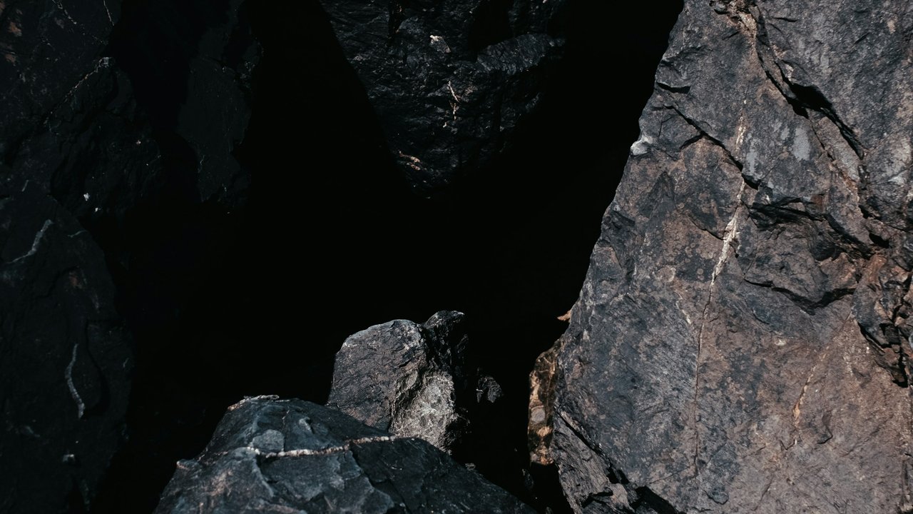 A pile of dark rocks.