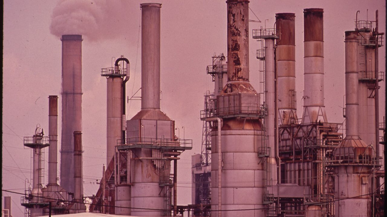 Tall chimneys and process towers at a chemical plant