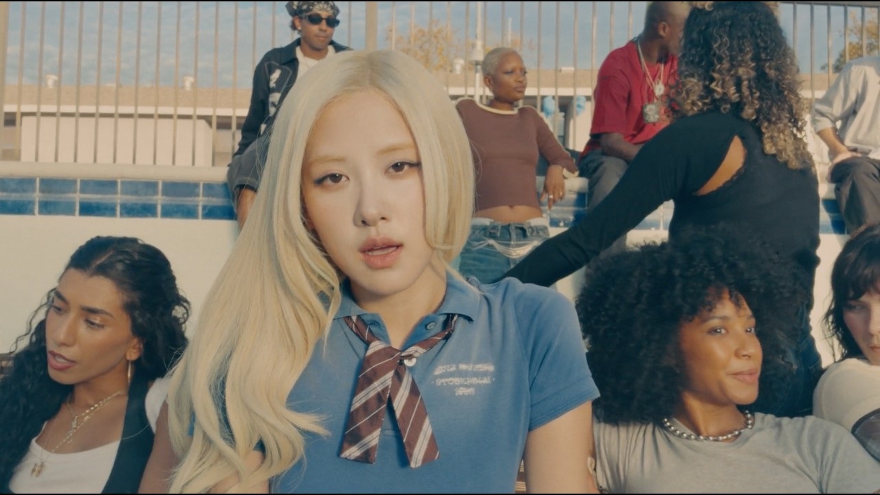 ROSÉ in the official new trick music video thumbnail, surrounded by other characters.