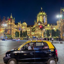 Black-and-yellow taxi