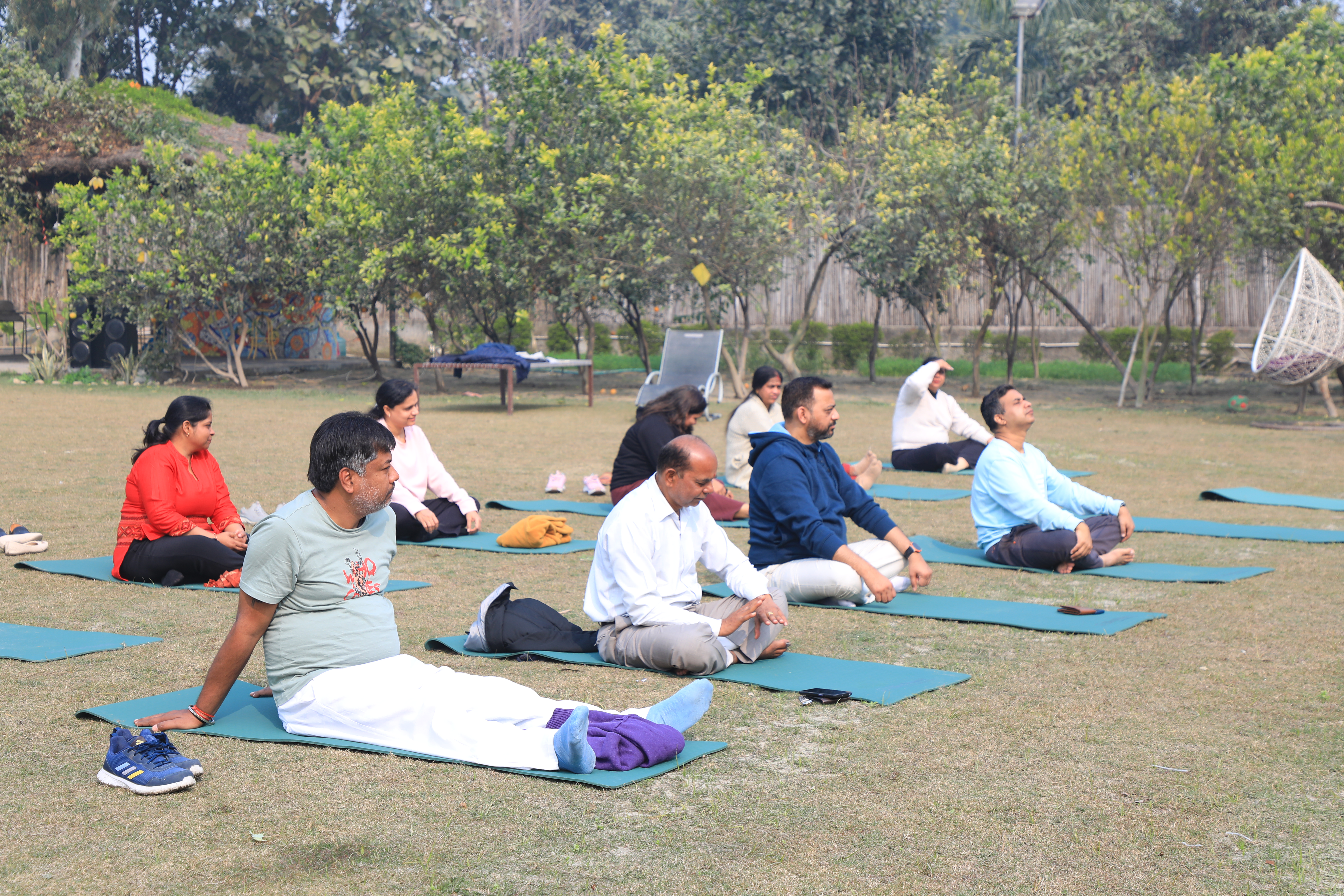Attendees participating in a yoga session at the 'From Chaos to Calm' event.