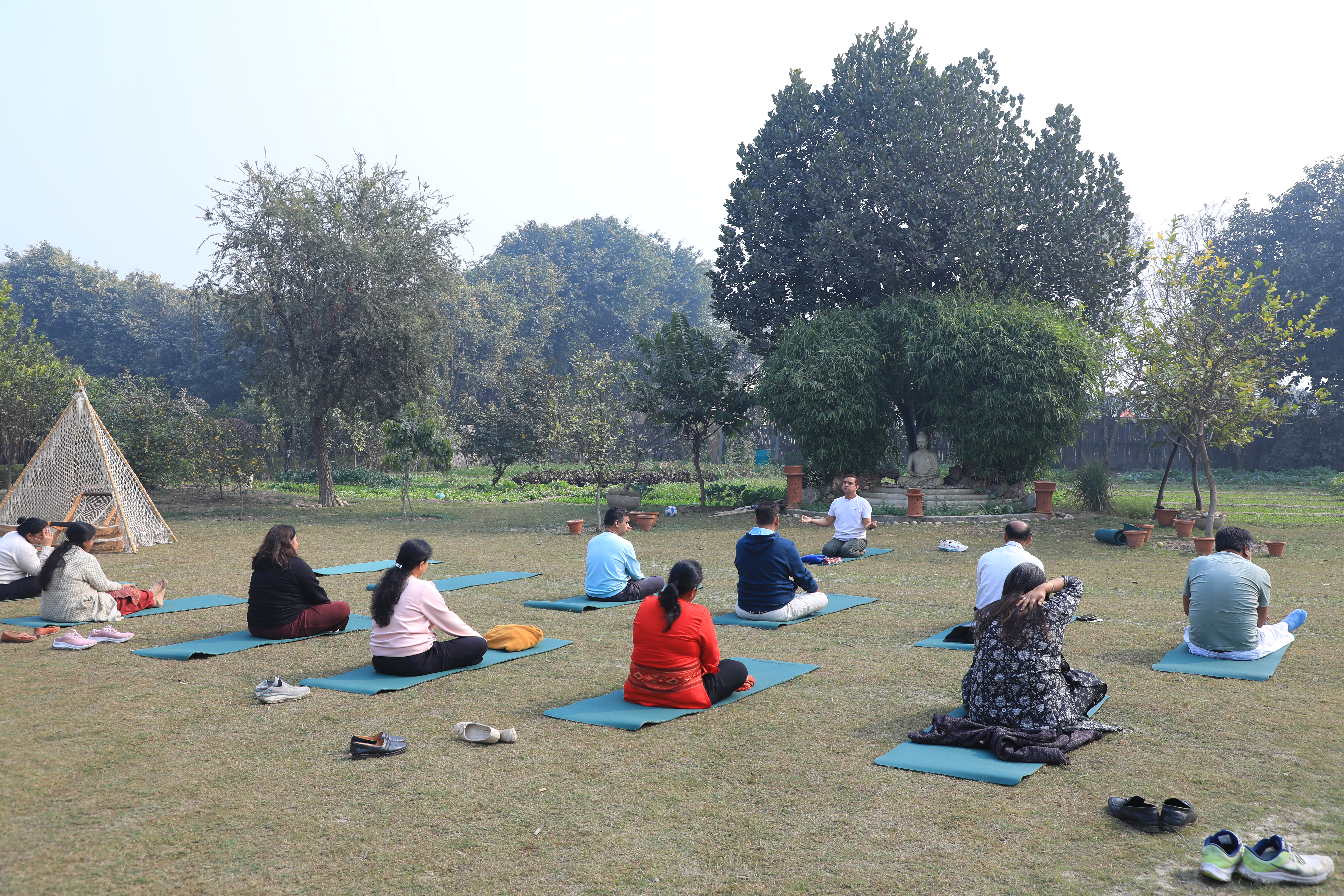 Attendees participating in a group activity outdoors.