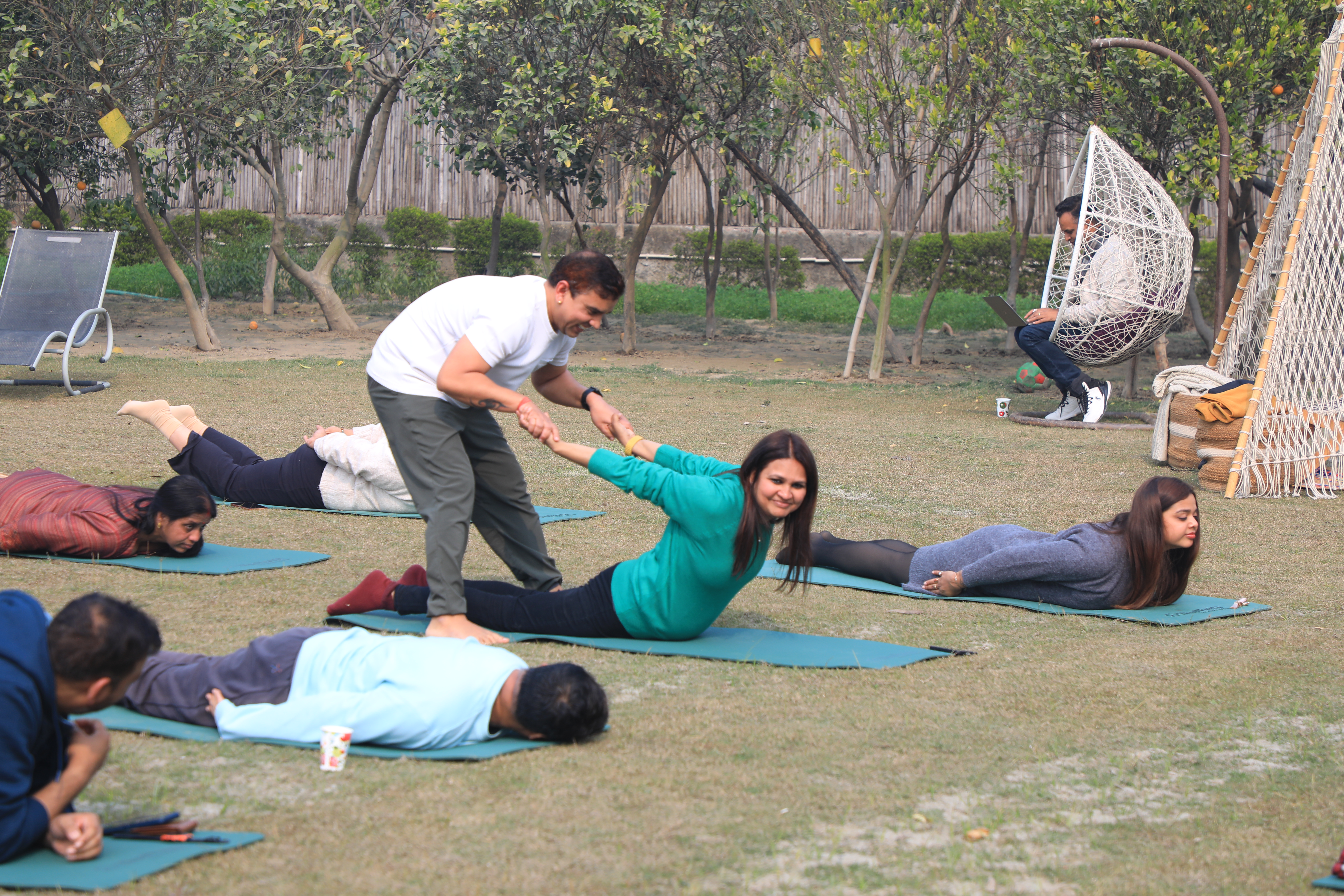 A close-up shot of a yoga session in progress.