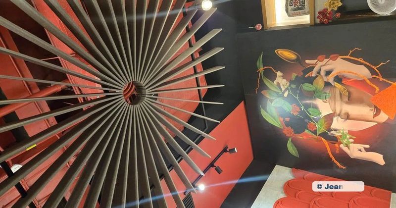 Bespoke ceiling with a painting on the wall
