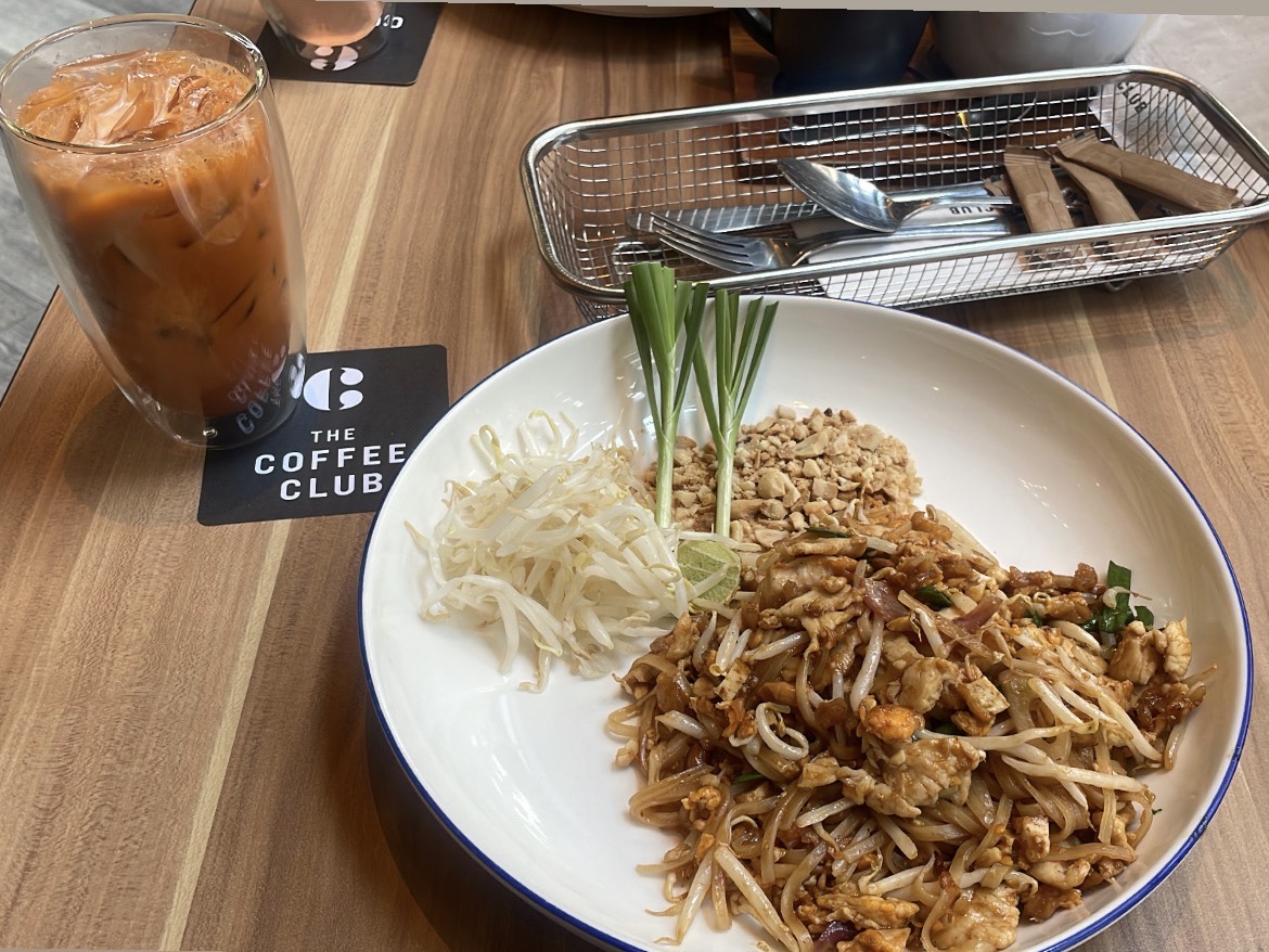 Pad Thai noodles and iced Thai tea at The Coffee Club in Vadhana District, Bangkok, Thailand