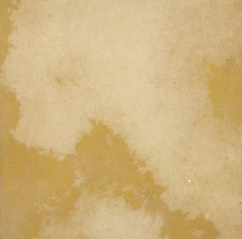 A warm vellum tile with a sunlit, honeyed wash and the soft translucency of true parchment. Tonal clouds drift across the surface like aged paper, creating a gentle patina that feels calm, artisanal, and quietly luxurious, by De Ferranti
