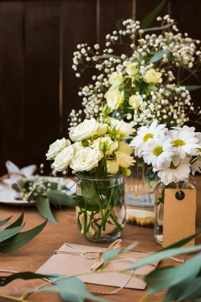 high-angle-blooming-flowers-vases.jpg