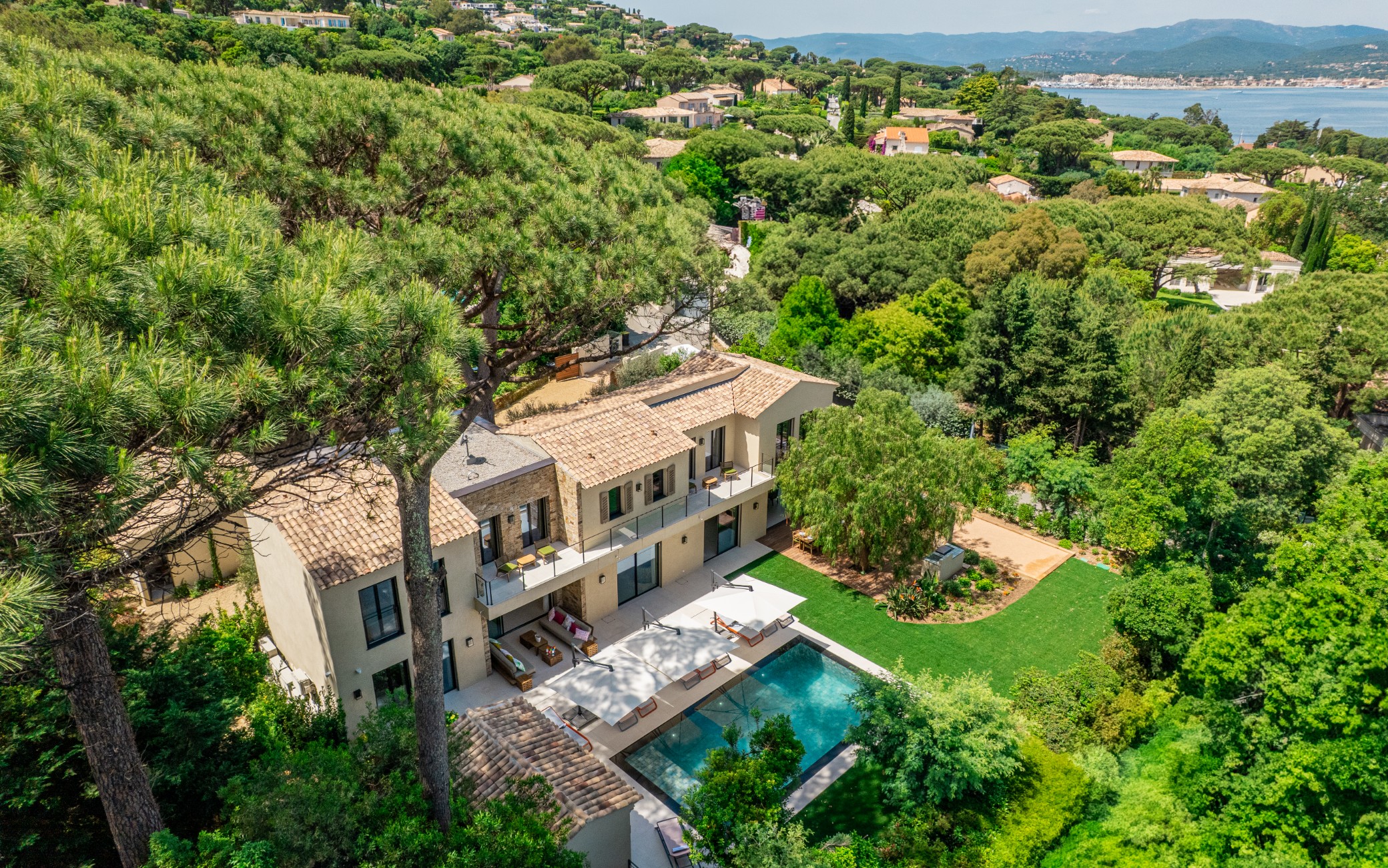  location - Sous les Pins - This luxury home offers a stunning sea view, a private pool, and a lush garden. Perfect for a dream life.