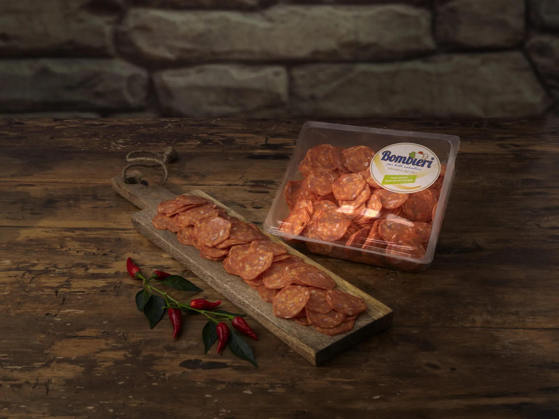 Tray of Bombieri cold cuts and salami slices on a wooden cutting board
