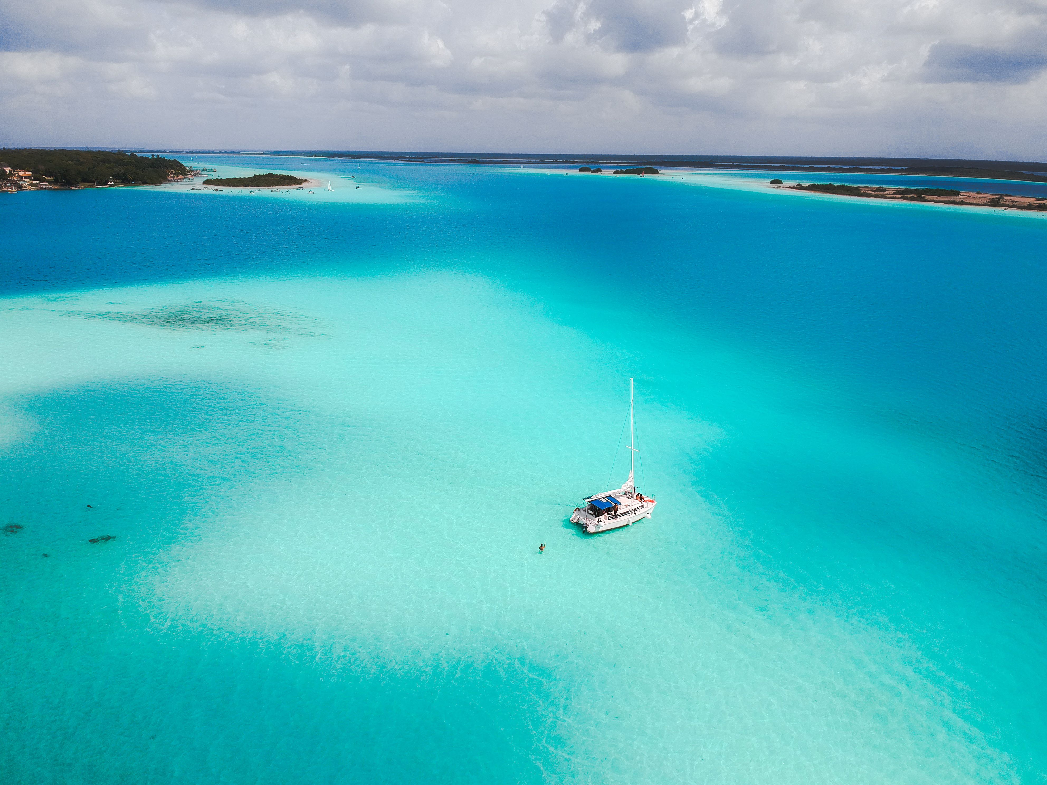 Private sailboat and aerial view of Bacalar Lagoon’s seven colors 2