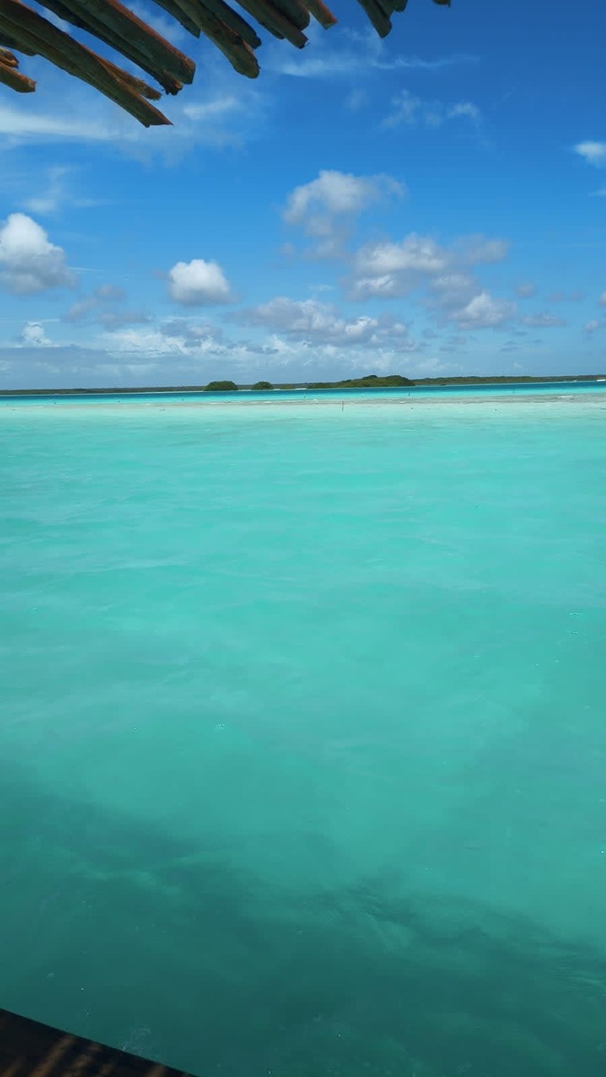 The peaceful blue horizon of Bacalar Lagoon