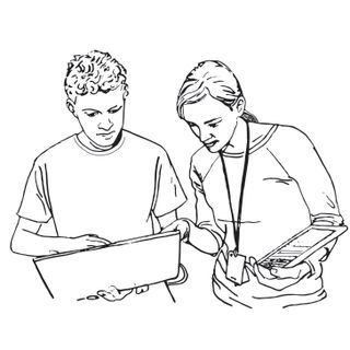 Two people with tablet computers, one pointing to the other’s screen.