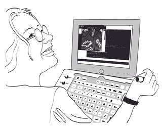A person smiling while watching a display with text and images.