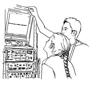 Two people staring at a data visualization above a stack of hardware with many controls.