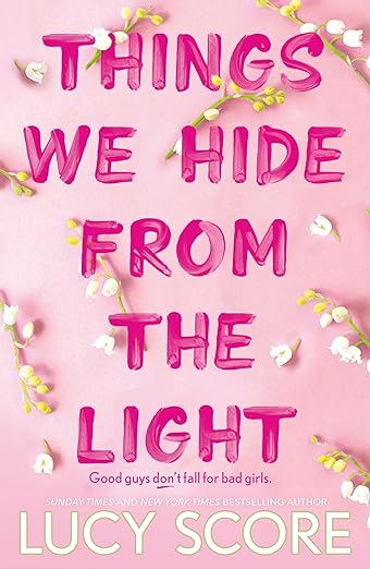 Book cover of Things We Hide From The Light by Lucy Score