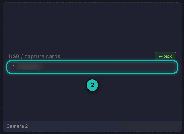 The tile's USB / capture cards list with a back button and one camera in it, ringed, its name blurred