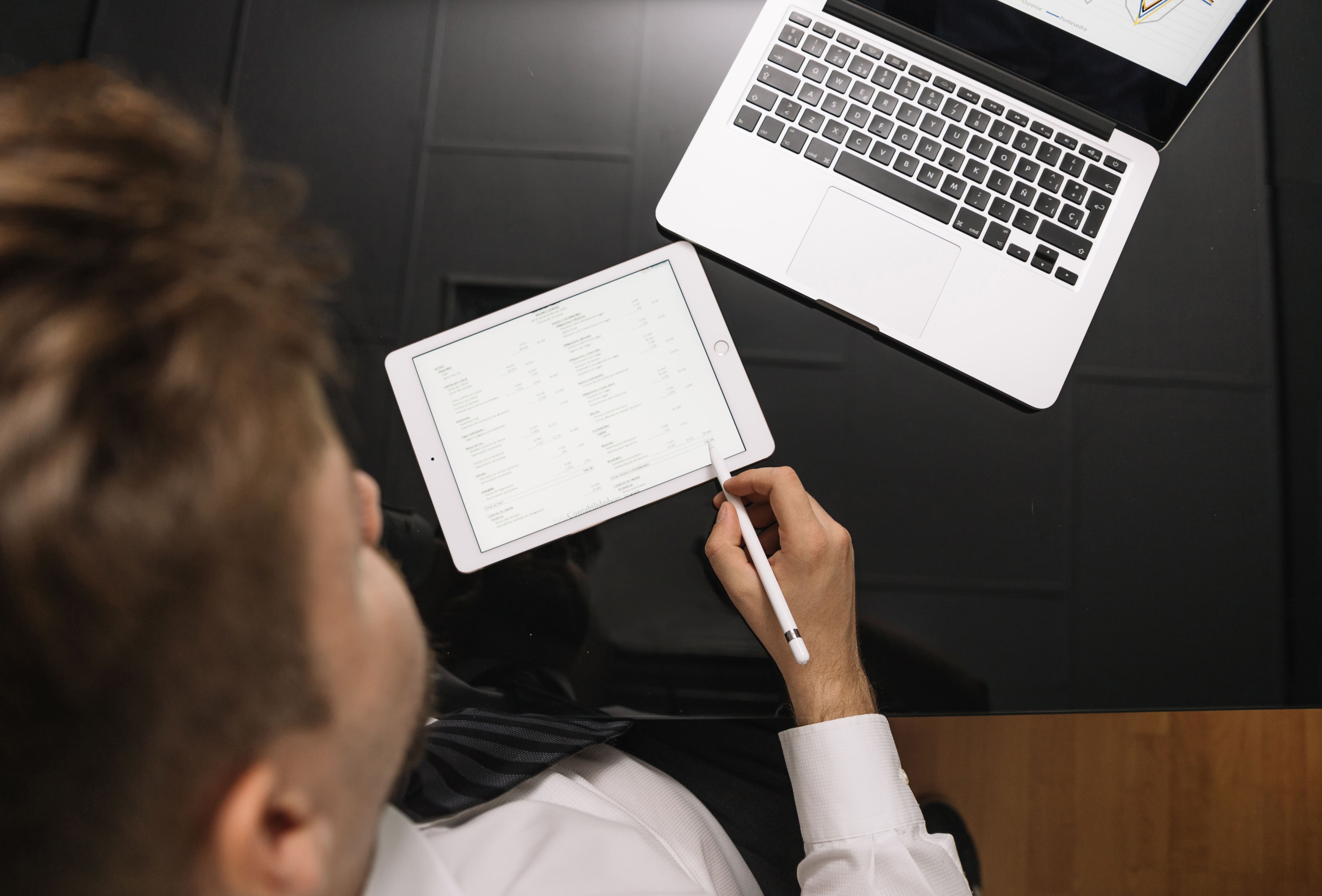 A person is taking notes on a digital device without AI note taking tool