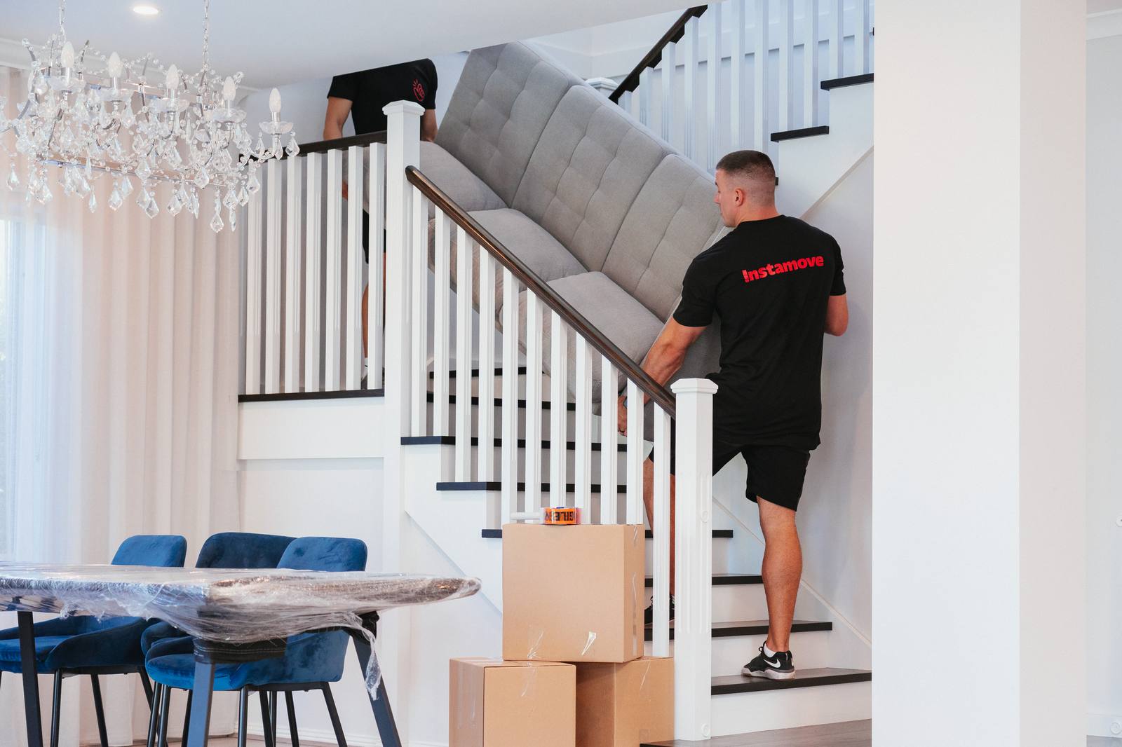 Removalist crew with a calm, friendly manner helping reduce family stress on moving day.