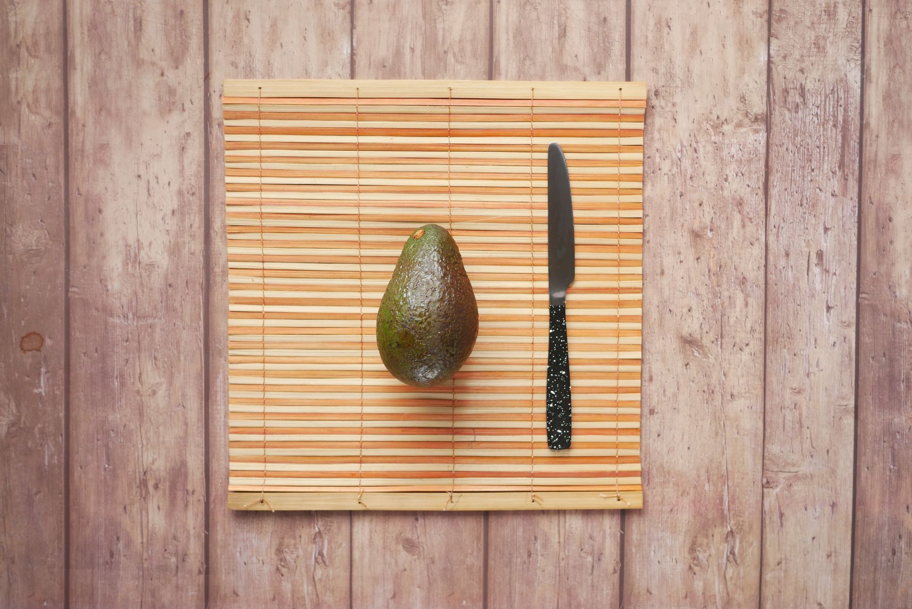 A side-by-side comparison of a 16-week fetus, an avocado, a banana, and a pear