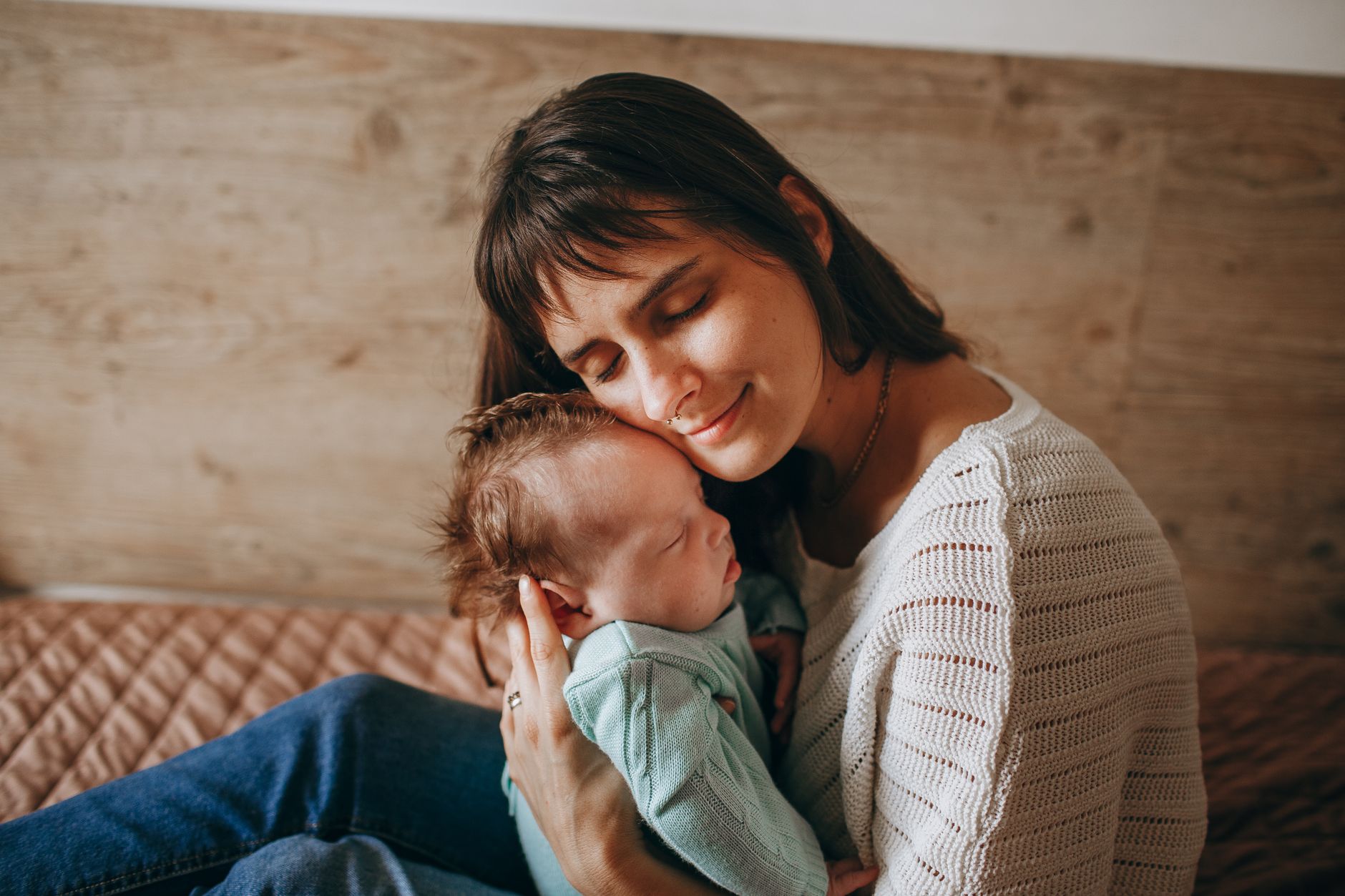 Parent soothing baby at bedtime