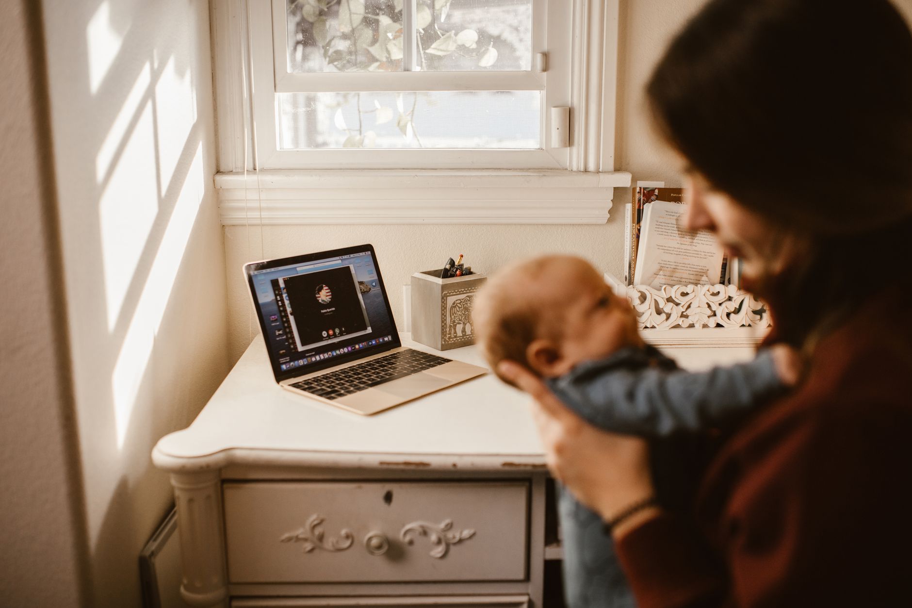 Mother completing insurance enrollment for newborn