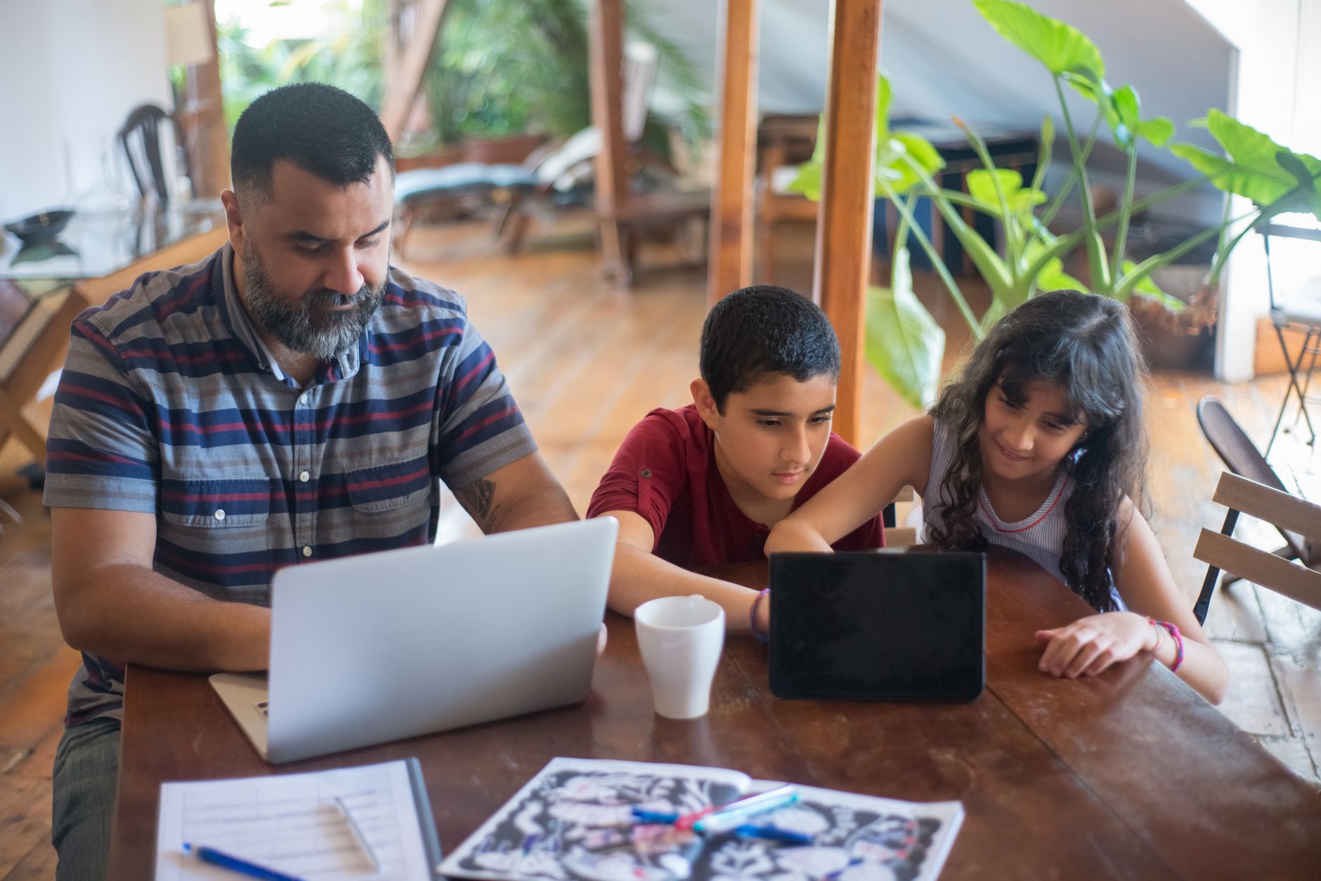 Family discussing allowance with a digital app