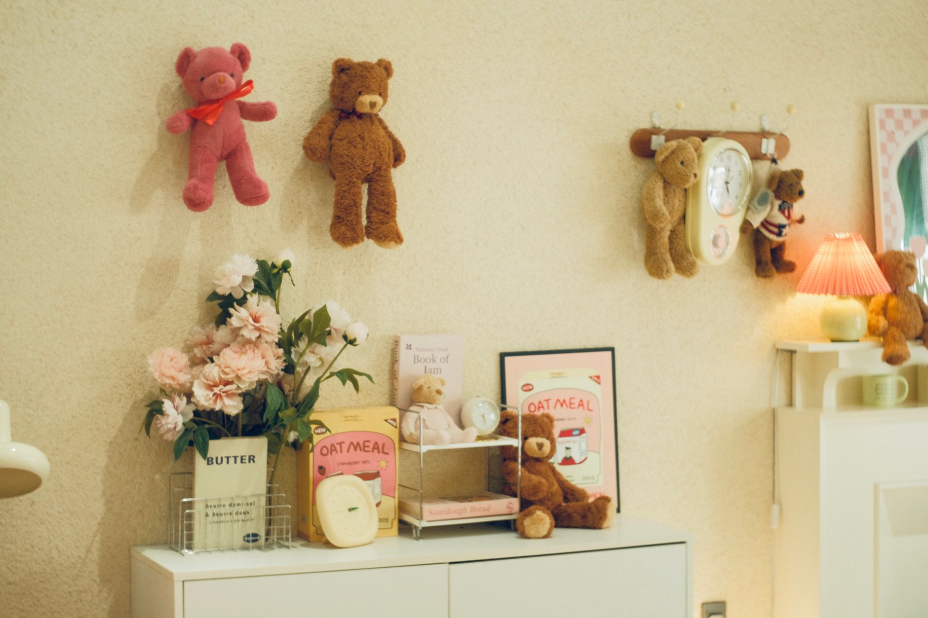 A cozy nursery corner with a small bookshelf, a plush blanket, and a jar of saved coins labeled 'College Fund', soft daylight through a window