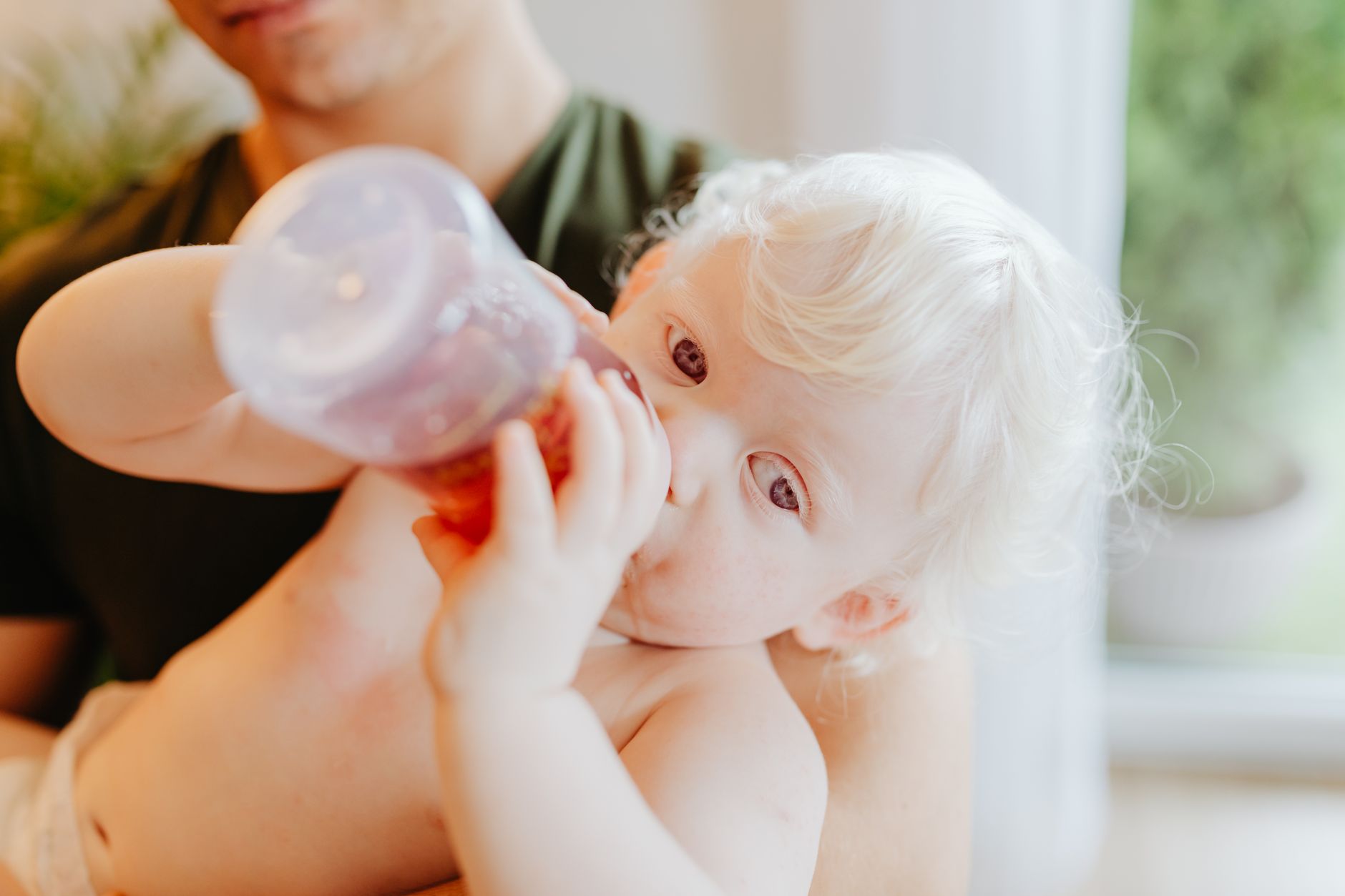 Parent skin-to-skin feeding with paced bottle