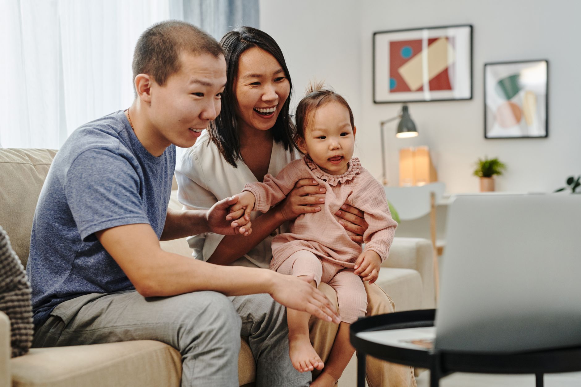 Virtual baby shower on a laptop screen with participants