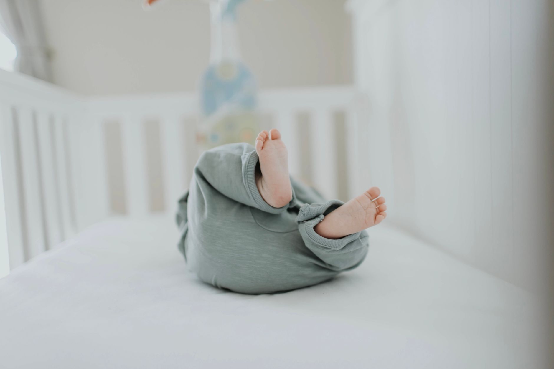 Infant sleep wedge under mattress
