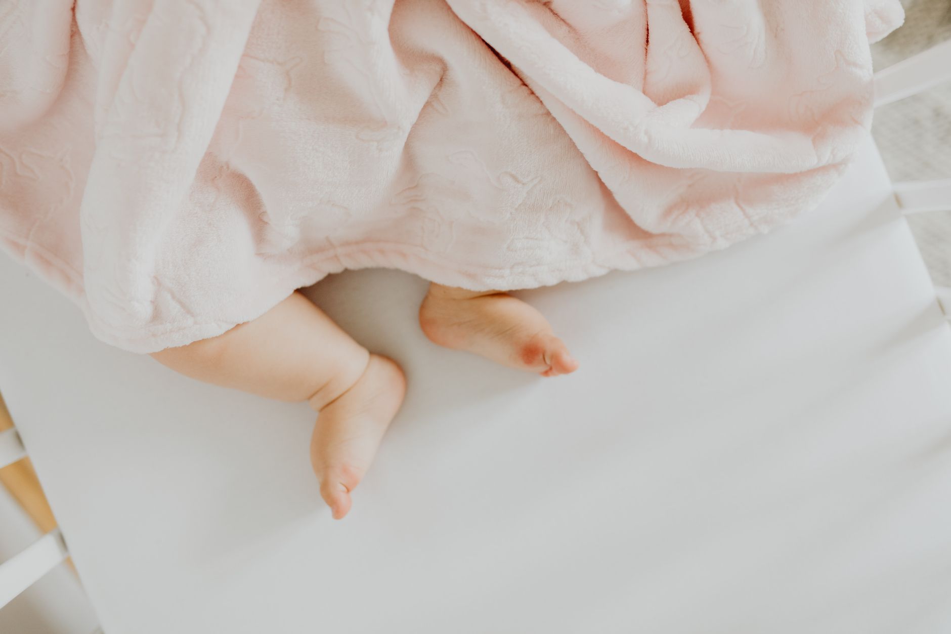 Infant wedge under mattress
