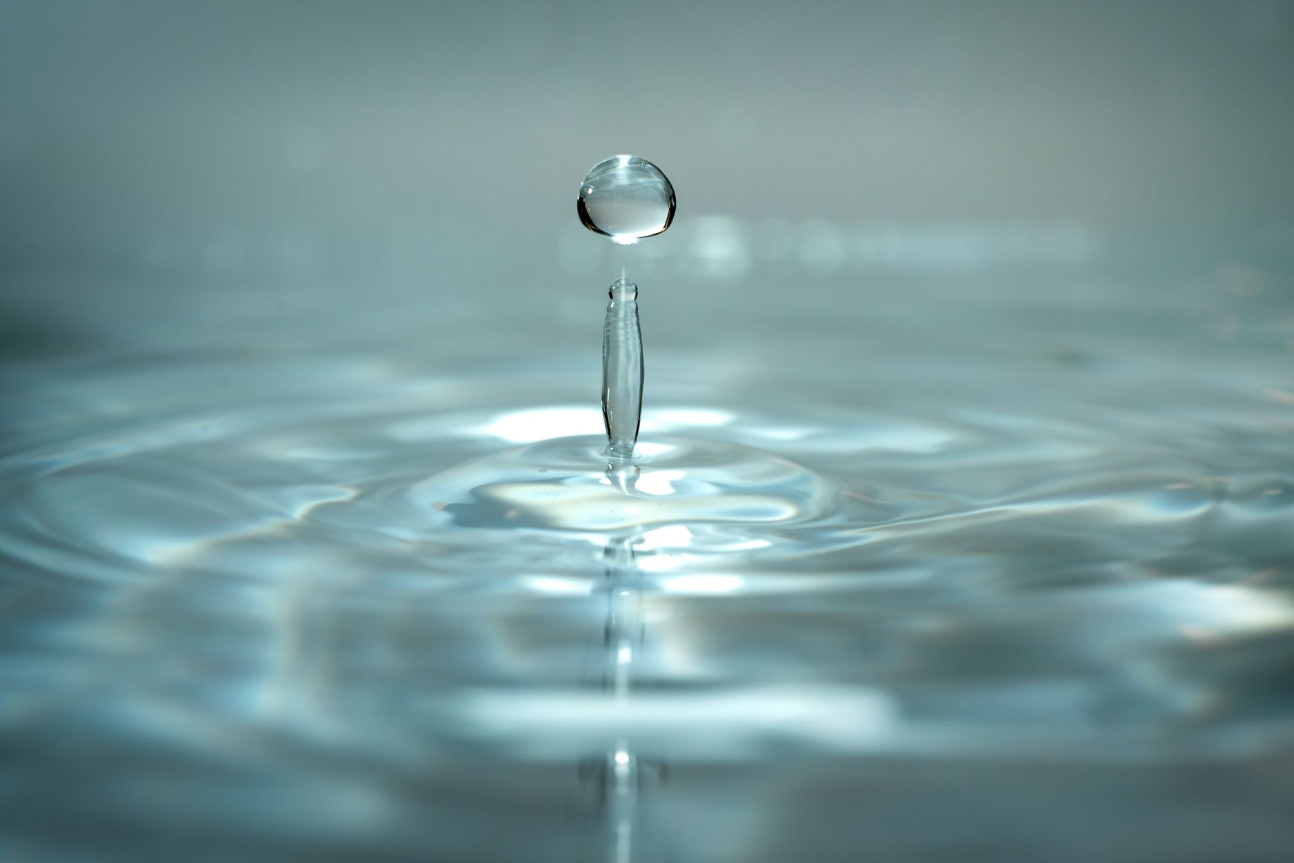 Close up of a baby spoon with a vitamin D drop