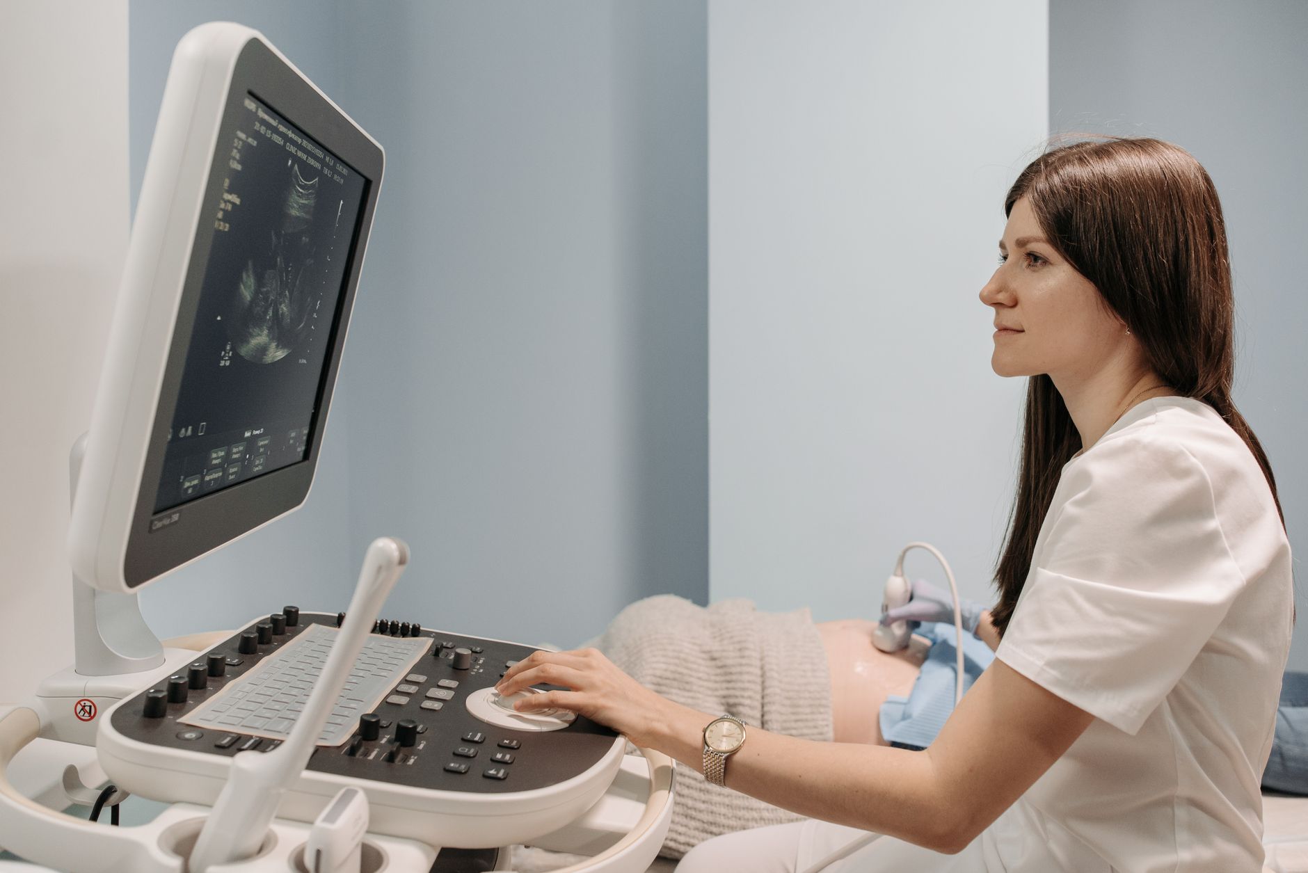 Obstetrician reviewing breech ultrasound