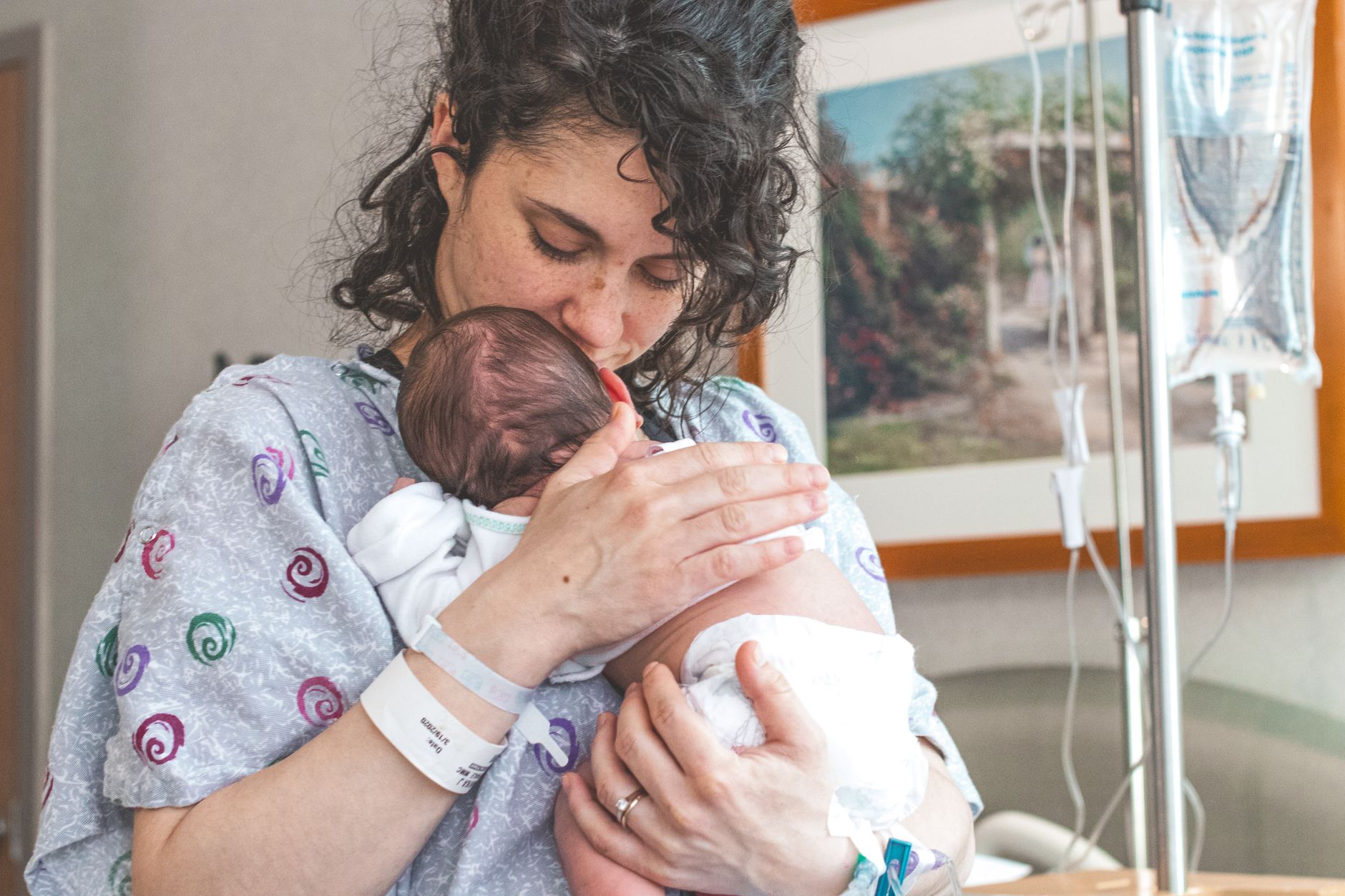 Mother massaging C-section scar