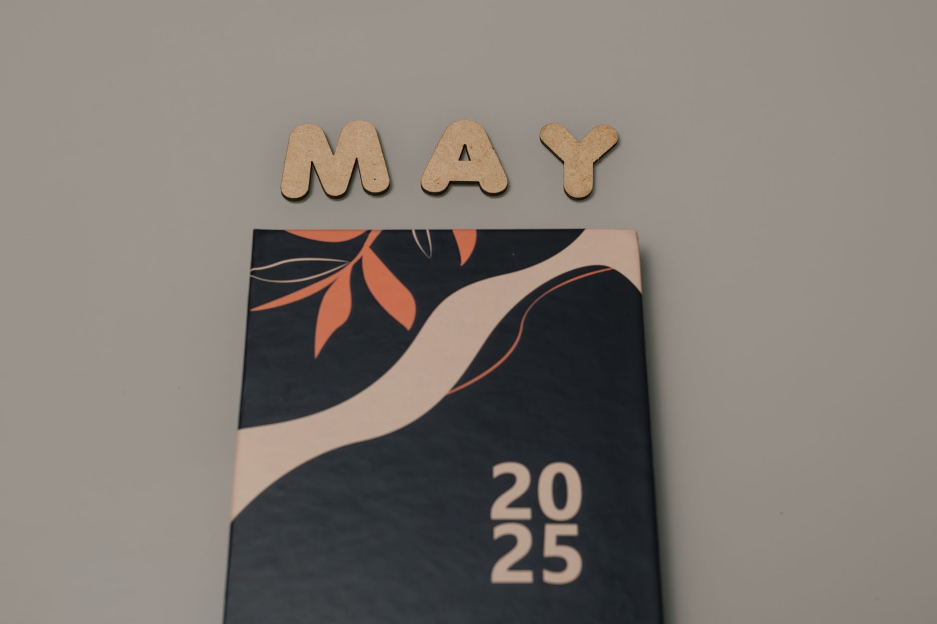 A calendar page marked with a three‑year timeline, a small red dot indicating the day of Nexplanon insertion, and a subtle overlay of a pregnant silhouette, illustrating the timeline of contraception and possible pregnancy