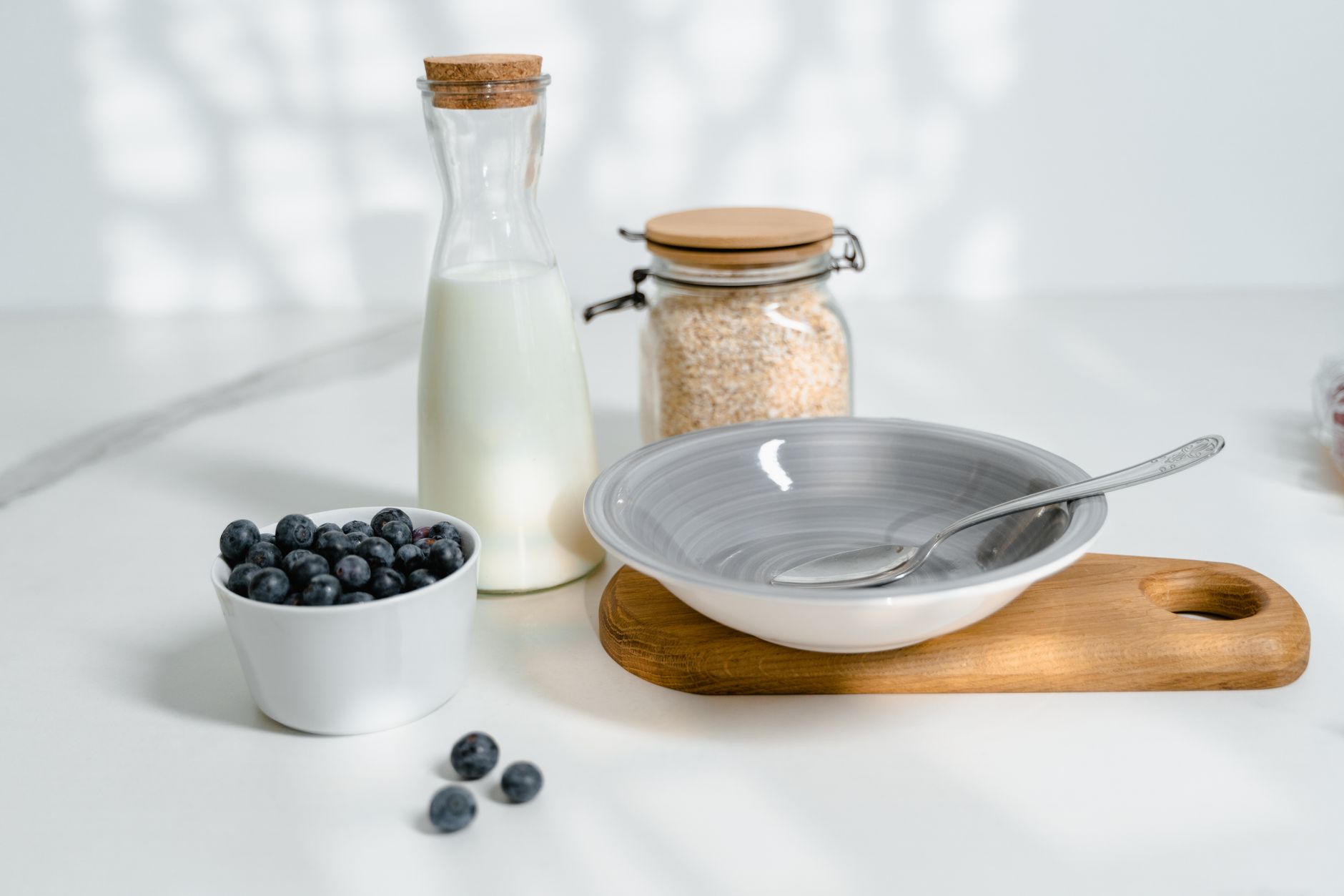 Coconut milk puree with fruit on a kitchen counter