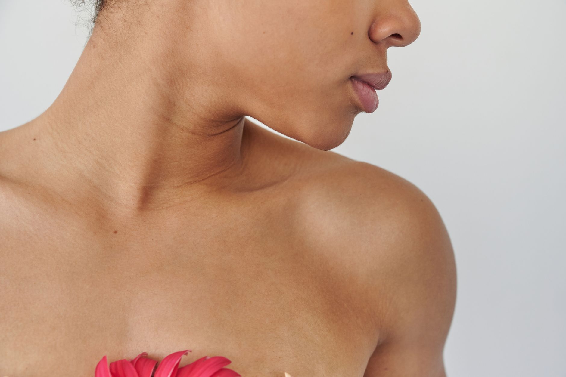 Close‑up of a child’s neck showing mild to severe retractions during a croup episode, with clear visual difference between levels
