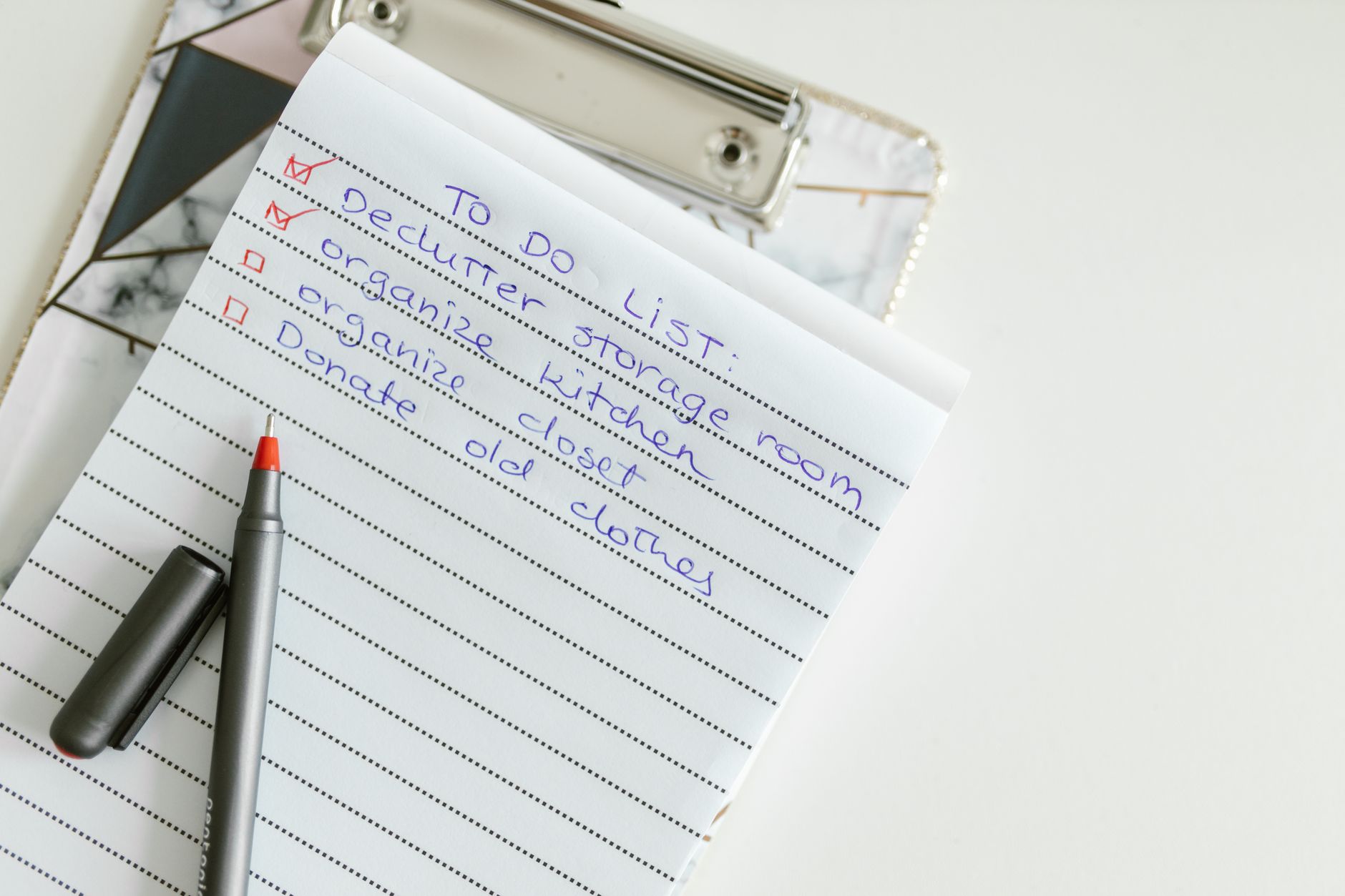 A decluttering checklist with checkboxes for organizing tasks.
