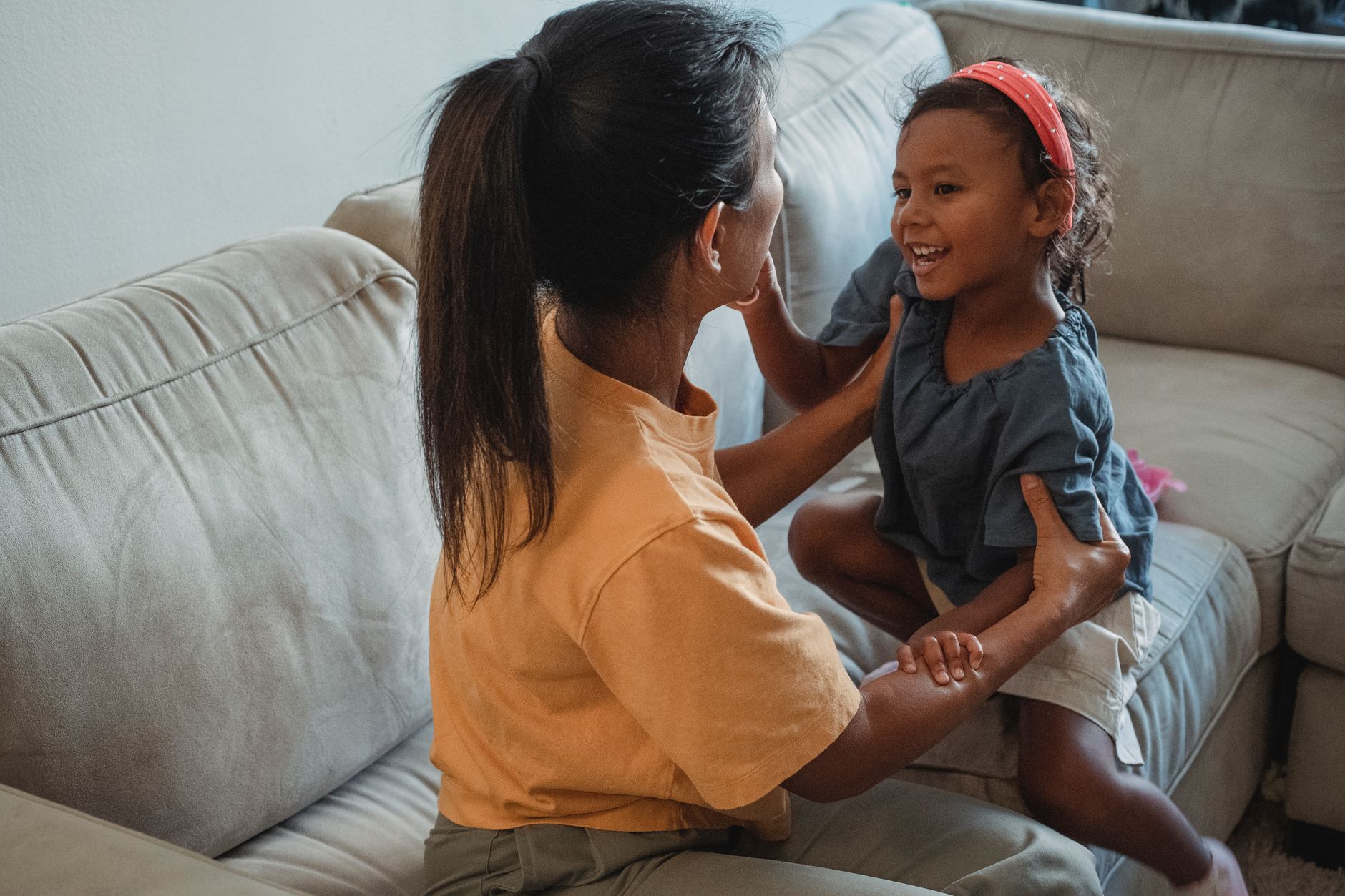 Mother and child playing happily