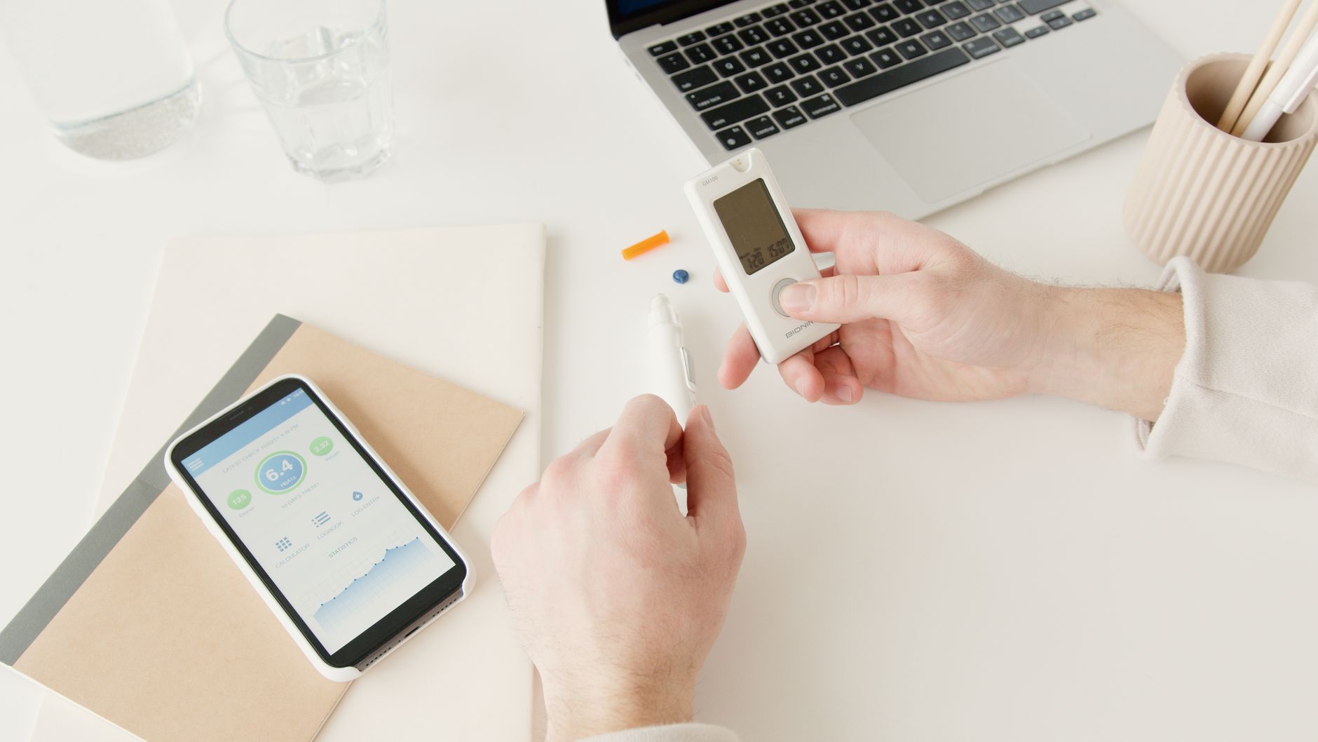 Pregnant woman monitoring blood sugar levels