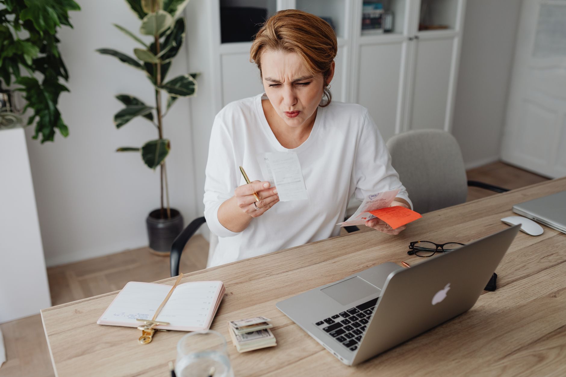 A woman budgeting for the holidays.