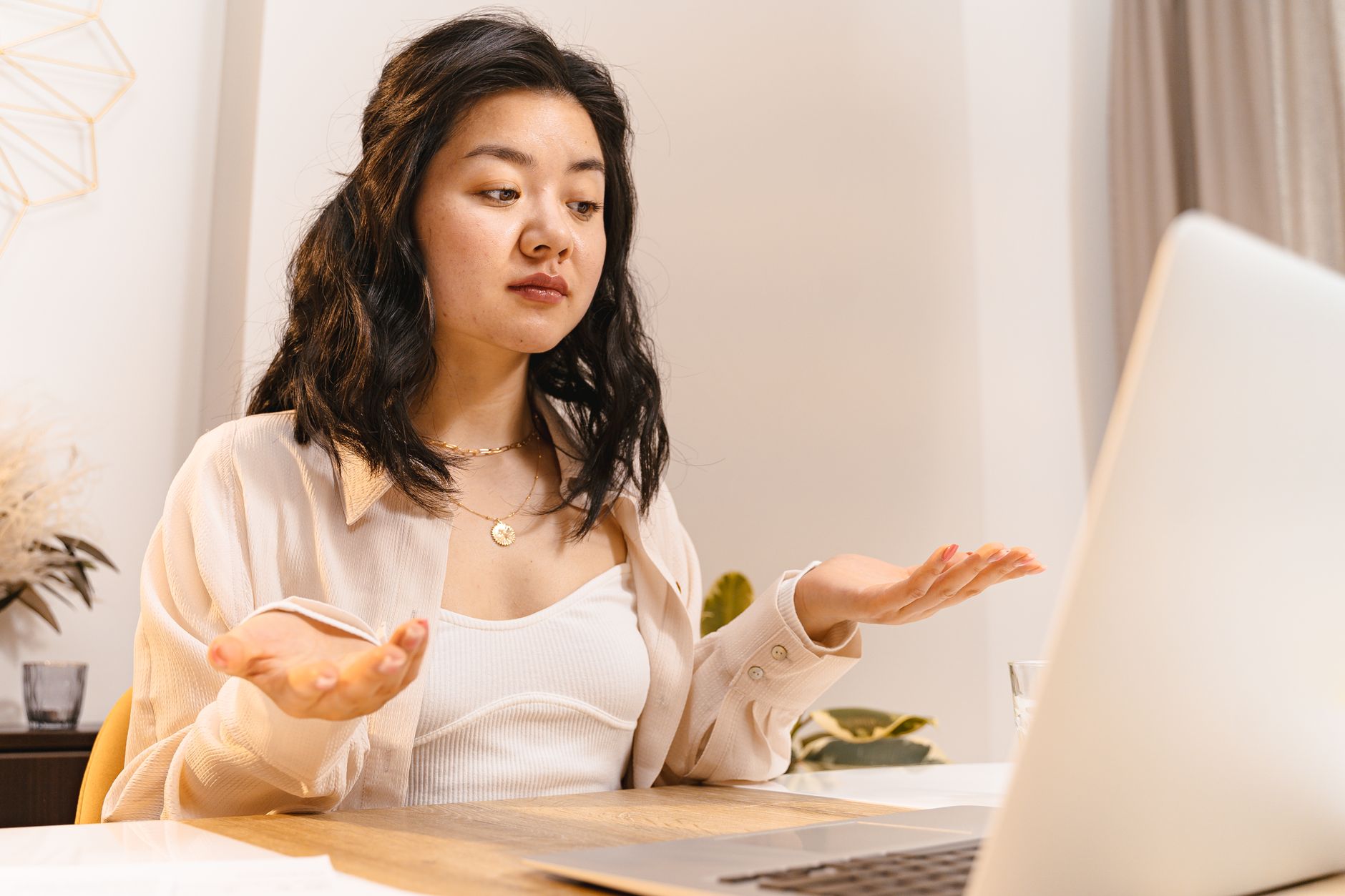 A woman reading FAQs about holiday loneliness.