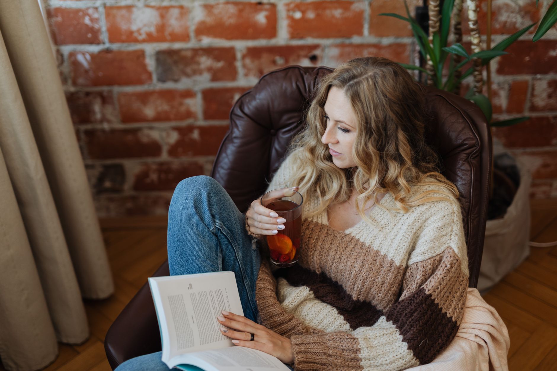 A woman practicing self-care during the holidays.