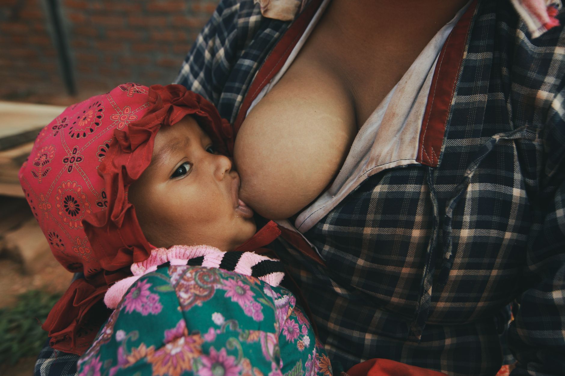 Mother pumping breastmilk