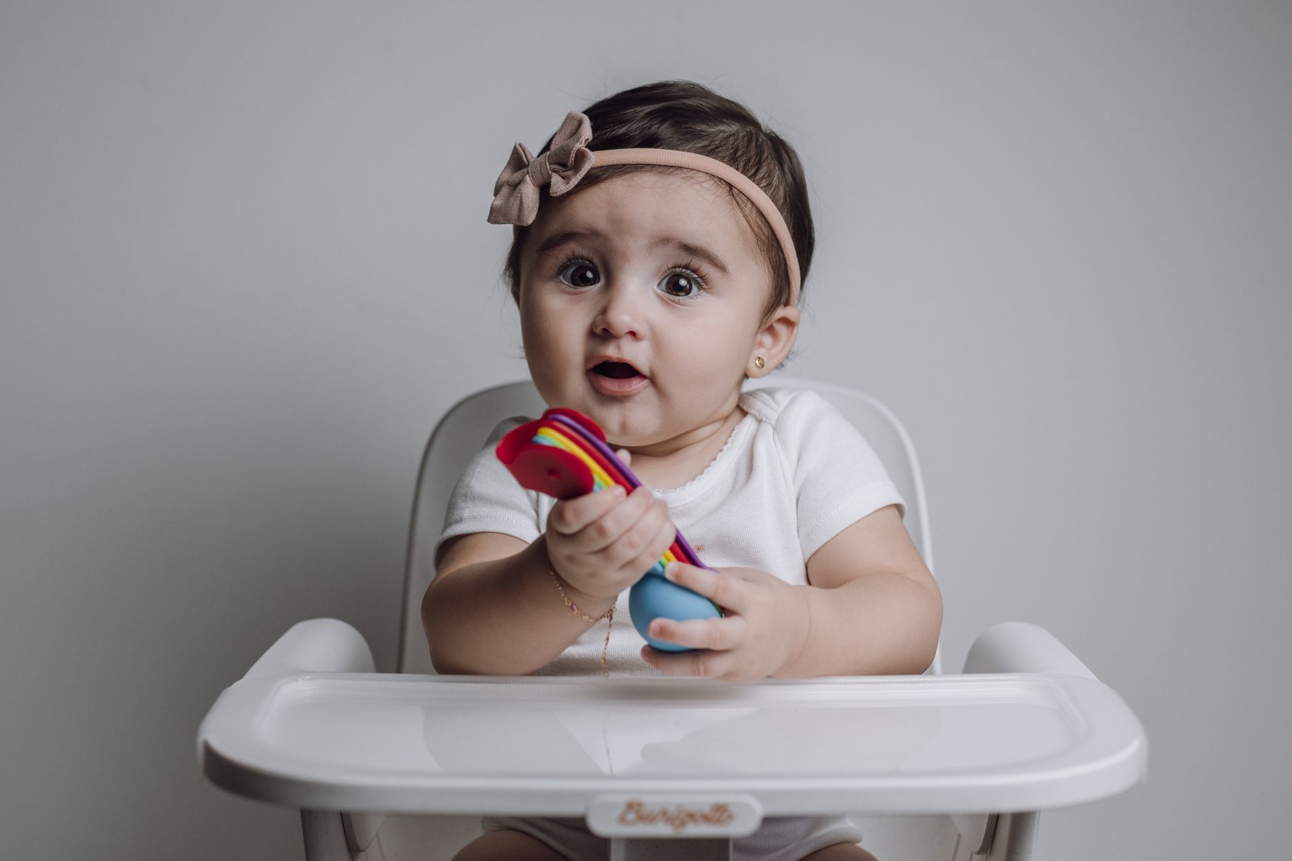 Toddler using a sippy cup