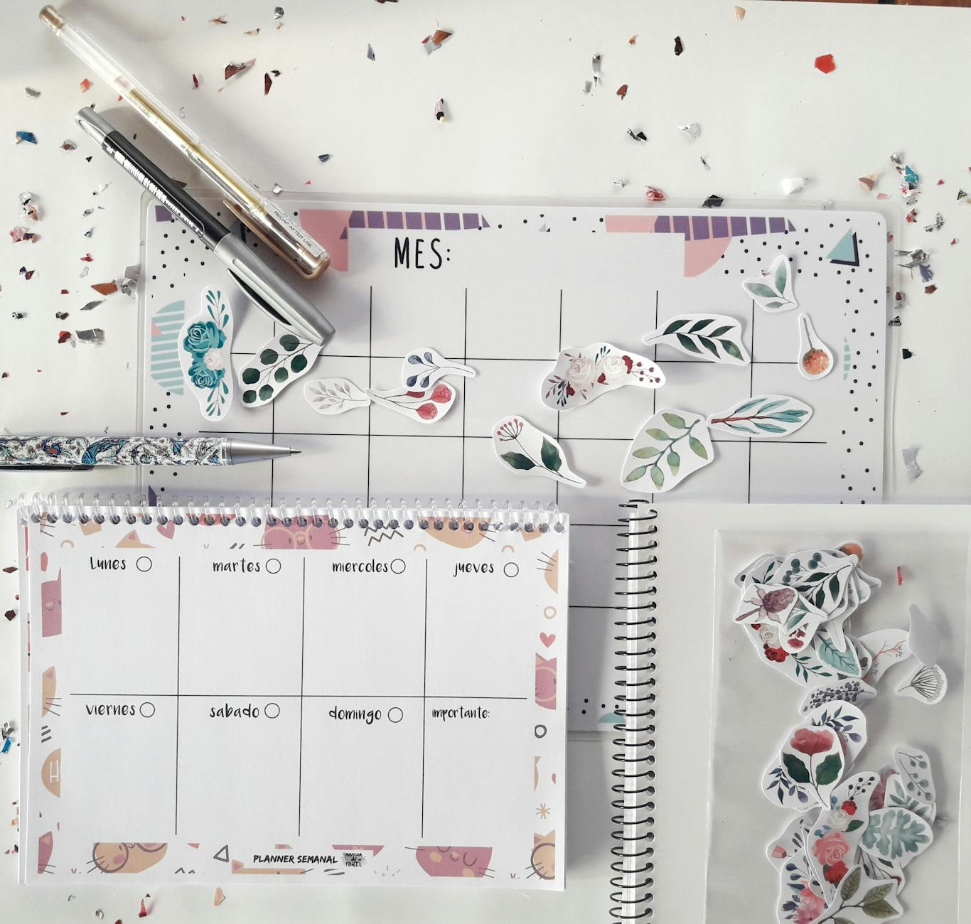 A soft calendar spread on a wooden table, showing highlighted weeks in pastel colors to illustrate baby age tracking