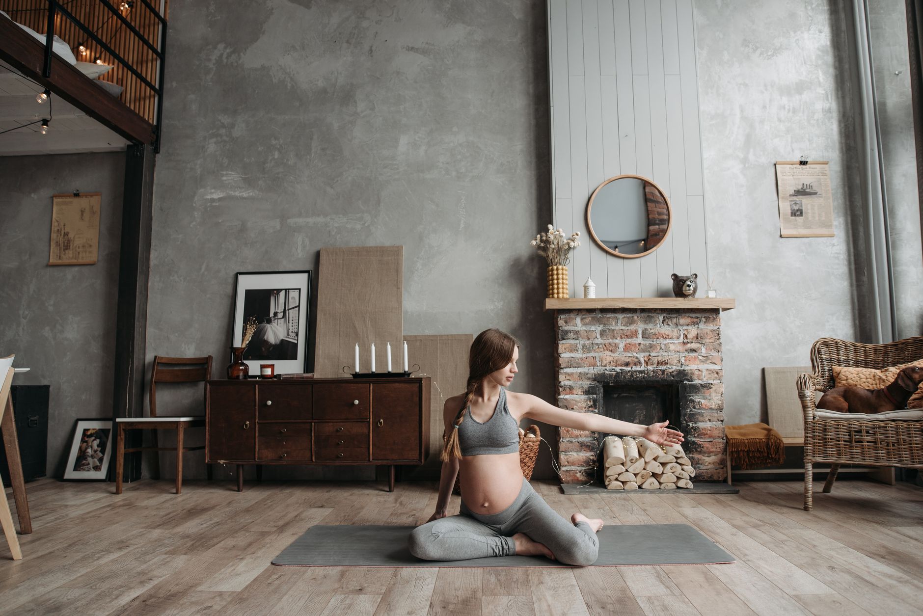 Pregnant woman practicing gentle yoga on a soft rug, natural daylight streaming through a window, cozy indoor setting with plants