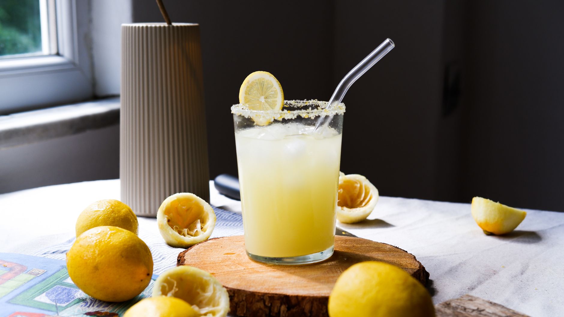 a tray of assorted pregnancy‑friendly drinks on a bright kitchen counter, including infused water, coconut water, and a small glass of Chick-fil A lemonade, soft morning light, 1200x675