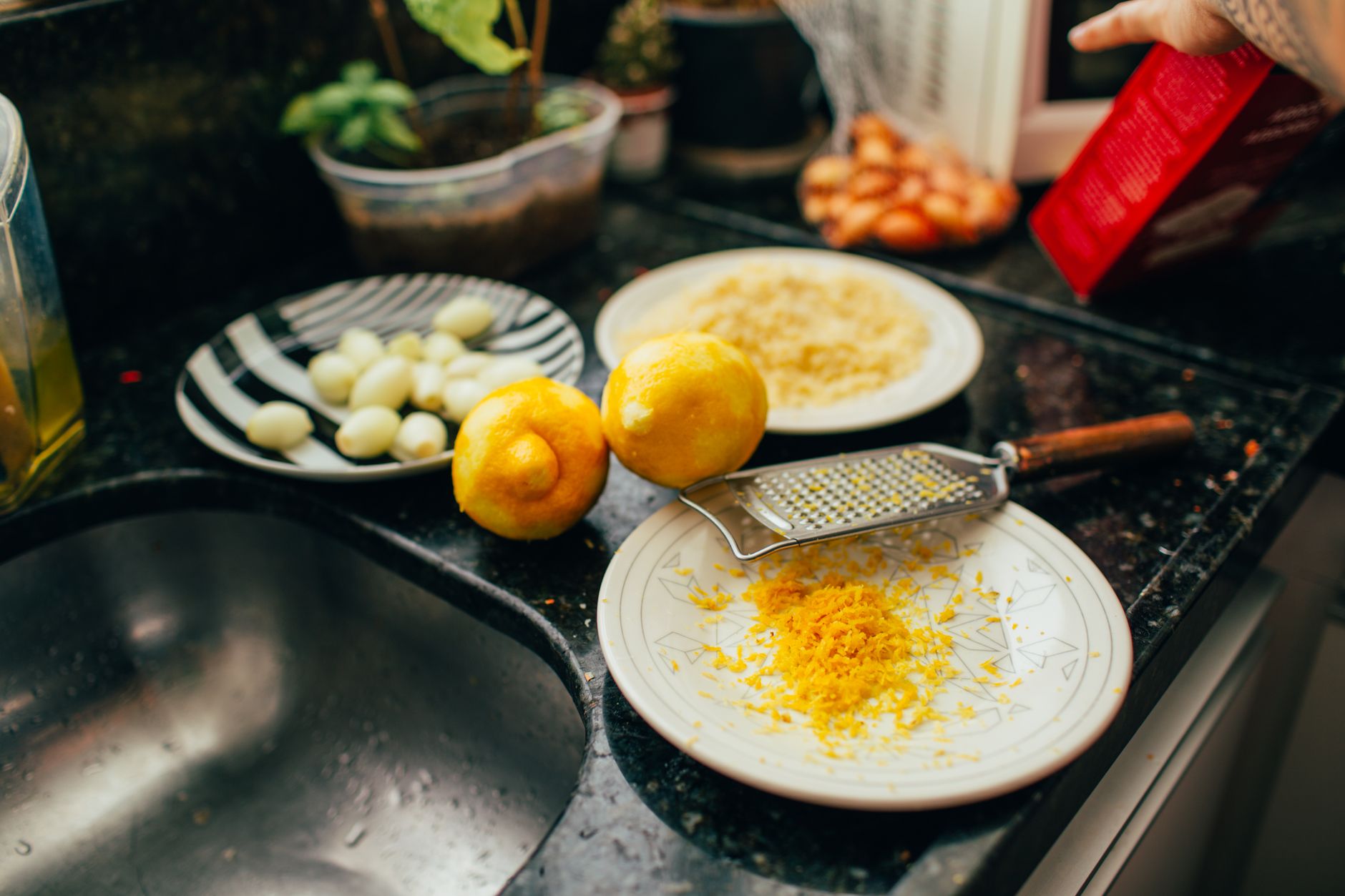 A tidy kitchen countertop displaying a variety of low‑mercury seafood options—shrimp, salmon fillets, and cod—next to a small bowl of fresh lemon wedges, illustrating safer alternatives to crab legs