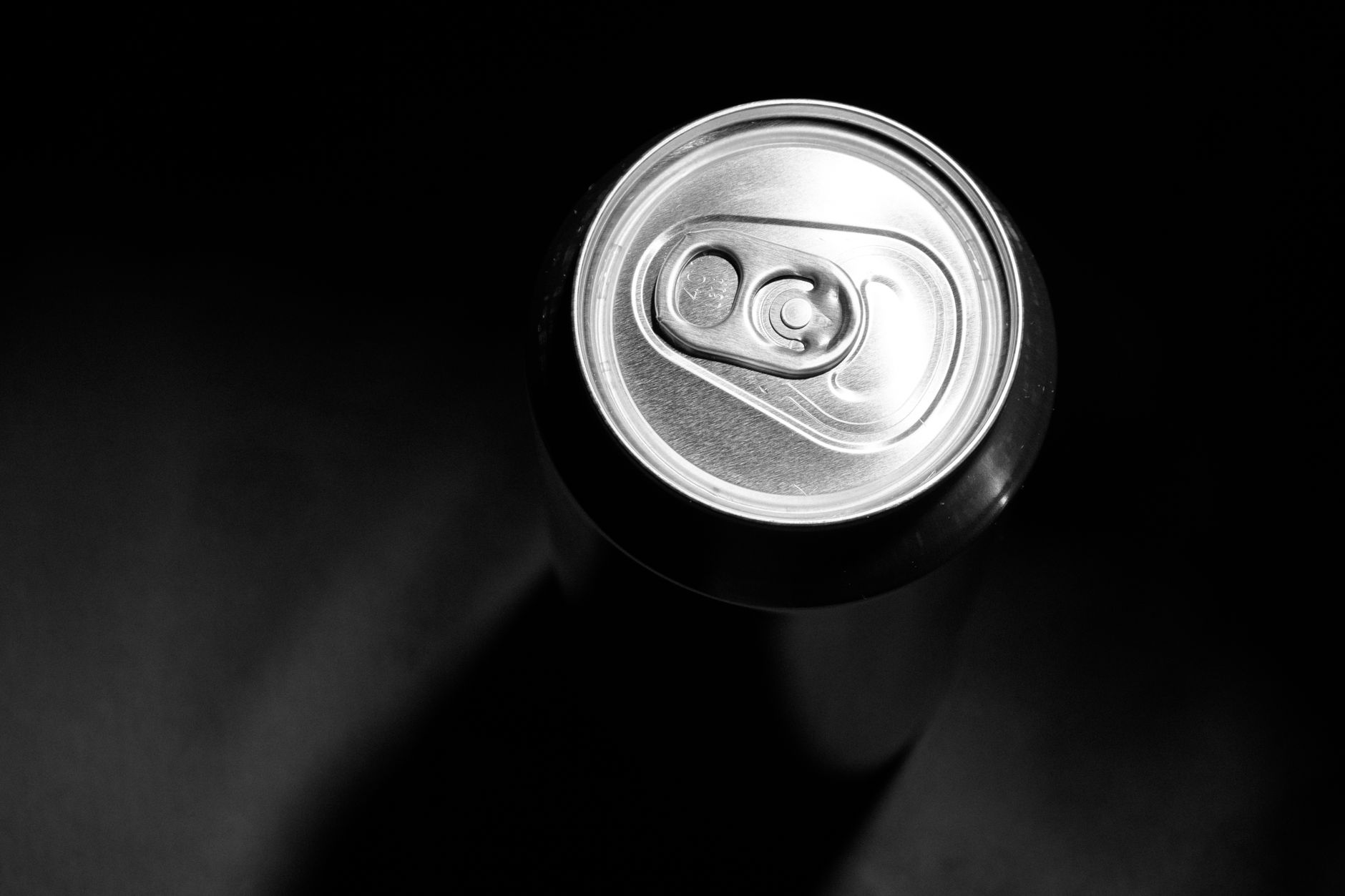 assortment of pregnancy‑safe beverages including sparkling water, herbal tea, and a can of non alcoholic beer, arranged on a pastel tablecloth for a calming visual guide